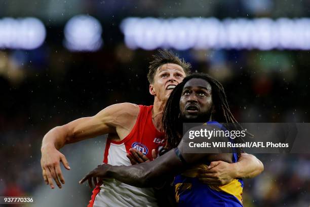 Callum Sinclair of the Swans contests a ruck with Nic Naitanui of the Eagles during the round one AFL match between the West Coast Eagles and the...