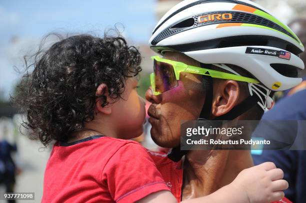 Amir Mustafa Rusli of Forca Amskins Racing Malaysia kisses his son during Stage 8 of the Le Tour de Langkawi 2018, Rembau-Kuala Lumpur 141.1 km on...