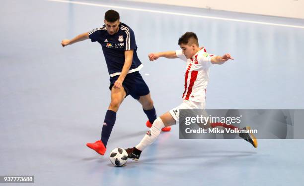 Jonas Berg of 1.FC Koeln challenges Marvin Boachie of Arsten during the final of the DFB Indoor Football match B-Junioren between 1.FC Koeln and TuS...