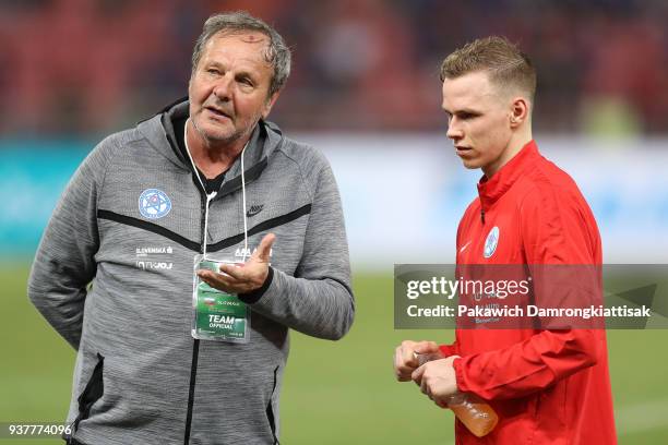 Jn Kozk , head coach of Slovakia national football team, gives advice to his player during the international friendly match between Thailand and...