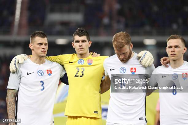 Martin Skrtel of Slovakia, Michal Sulla of Slovakia, Adam Nemec of Slovakia and Ondrej Duda of Slovakia sing Slovakia's national anthem during the...