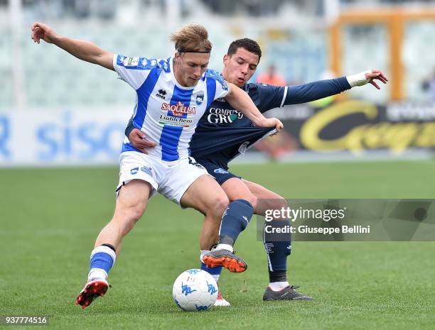 Alessandro Crescenzi of Pescara and Ismael Bennacer of Empoli FC in action during the serie B match between Pescara and Empoli FC at Adriatico...