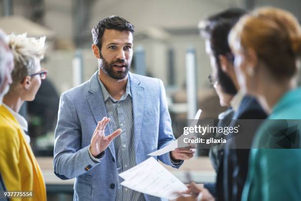 factory staff meeting. - managers stock pictures, royalty-free photos & images