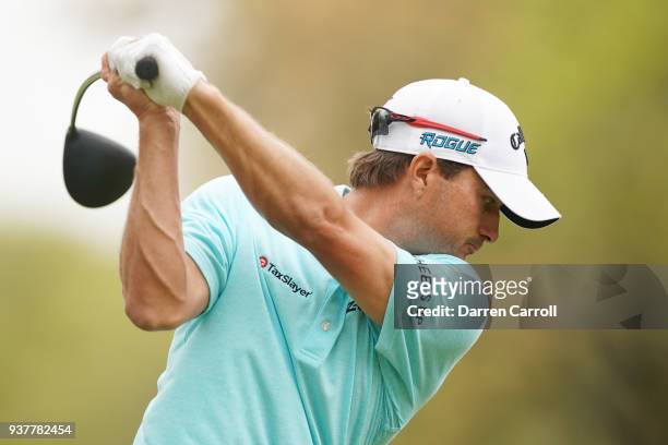 Kevin Kisner of the United States plays his shot from the eighth tee during his semifinal round match against Alexander Noren of Sweden in the World...