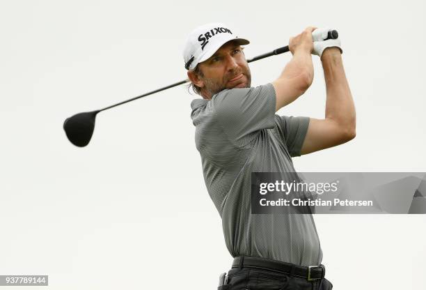 George McNeill plays his shot from the first tee during the final round of the Corales Puntacana Resort & Club Championship on March 25, 2018 in...