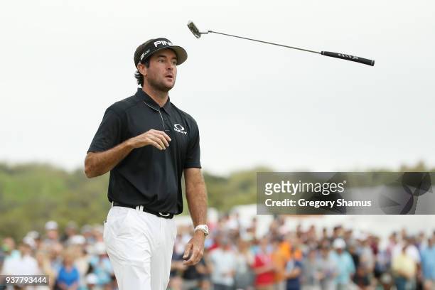 Bubba Watson of the United States reacts to a missed birdie putt on the 13th green during his semifinal round match against Justin Thomas of the...