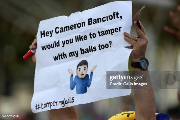 Fan holds up a poster during day 4 of the 3rd Sunfoil Test match between South Africa and Australia at PPC Newlands on March 25, 2018 in Cape Town,...