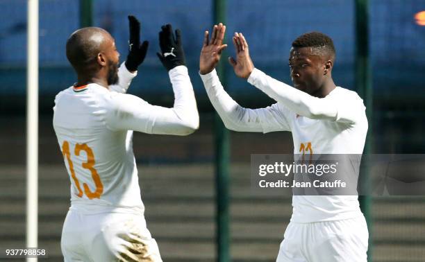 Nicolas Pepe of Ivory Coast celebrates his second goal with Giovanni Sio during the international friendly match between Togo and Ivory Coast at...