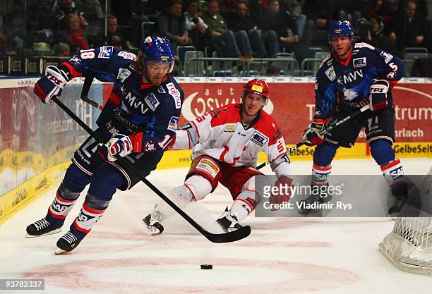 Ahren Spylo of Adler controls the puck during the Deutsche Eishockey Liga game between Adler Mannheim and Hannover Scorpions at SAP Arena on December...