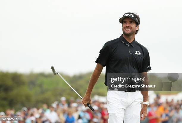 Bubba Watson of the United States reacts on the 13th green during his semifinal round match against Justin Thomas of the United States in the World...