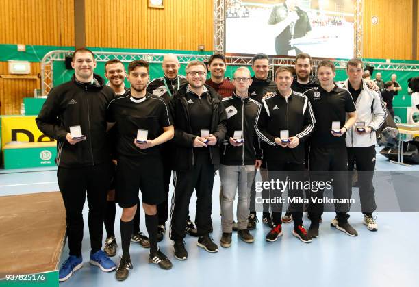 Referees poses during the DFB Indoor Football winning ceremony on March 25, 2018 in Gevelsberg, Germany.