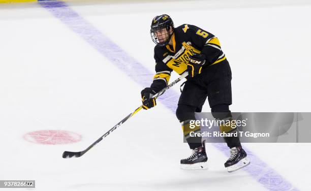 Mitch Reinke of the Michigan Tech Huskies skates against the Notre Dame Fighting Irish during the NCAA Division I Men's Ice Hockey East Regional...