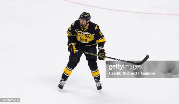 Cooper Watson of the Michigan Tech Huskies skates against the Notre Dame Fighting Irish during the NCAA Division I Men's Ice Hockey East Regional...