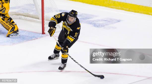 Mark Auk of the Michigan Tech Huskies skates against the Notre Dame Fighting Irish during the NCAA Division I Men's Ice Hockey East Regional...