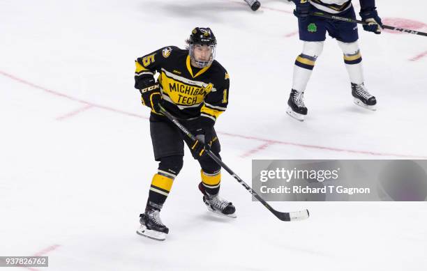 Jake Lucchini of the Michigan Tech Huskies skates against the Notre Dame Fighting Irish during the NCAA Division I Men's Ice Hockey East Regional...