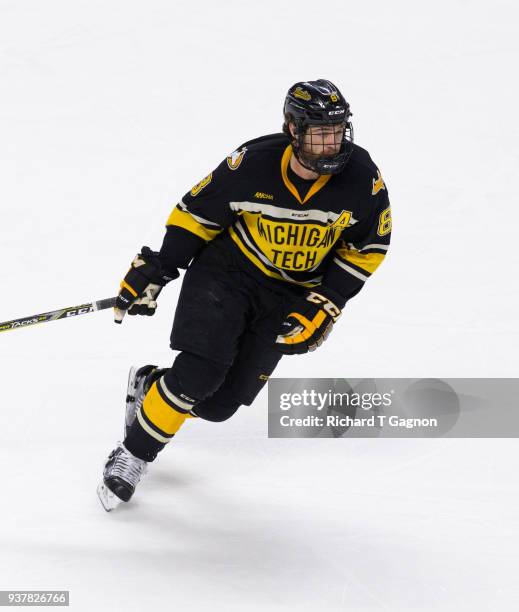 Dylan Steman of the Michigan Tech Huskies skates against the Notre Dame Fighting Irish during the NCAA Division I Men's Ice Hockey East Regional...