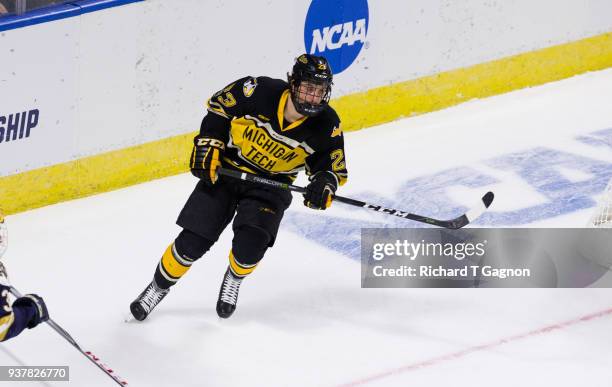 Raymond Brice of the Michigan Tech Huskies skates against the Notre Dame Fighting Irish during the NCAA Division I Men's Ice Hockey East Regional...
