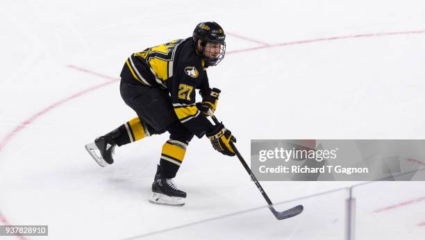 Mitch Meek of the Michigan Tech Huskies skates against the Notre Dame Fighting Irish during the NCAA Division I Men's Ice Hockey East Regional...