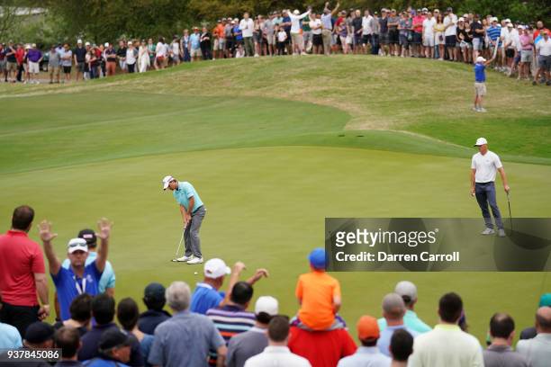 Kevin Kisner of the United States putts on the 16th green during his semifinal round match against Alexander Noren of Sweden in the World Golf...