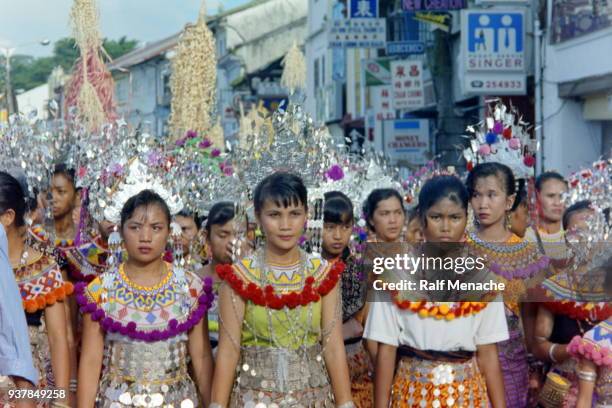 the nineties. parade of the gawai dayak festival. kuching, sarawak malaysia. - gawai dayak stock pictures, royalty-free photos & images