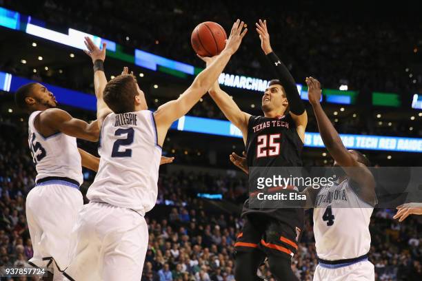 Davide Moretti of the Texas Tech Red Raiders drives to the basket during the first half against the Villanova Wildcats in the 2018 NCAA Men's...