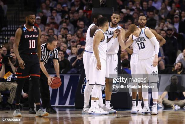 The Villanova Wildcats huddle during the first half against the Texas Tech Red Raiders in the 2018 NCAA Men's Basketball Tournament East Regional at...