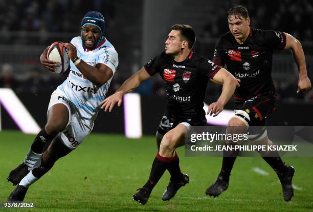 Racing92's prop Eddy Ben Arous vies with Lyon's French scrum-half Baptiste Couilloud and Lyon's South African lock Etienne Oosthuizen during the...