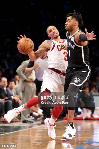 George Hill of the Cleveland Cavaliers collides with D'Angelo Russell of the Brooklyn Nets in the third quarter during their game at Barclays Center...