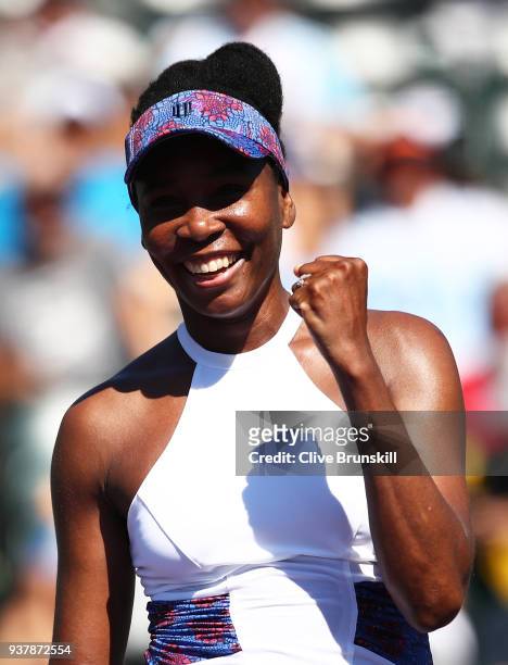 Venus Williams of the United States celebrates match point against Kiki Bertens of the Netherlands in their third round match during the Miami Open...