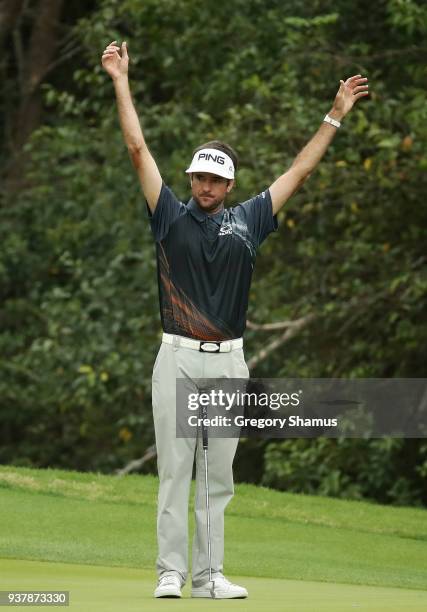 Bubba Watson of the United States reacts on the third green during his final round match against Kevin Kisner of the United States in the World Golf...