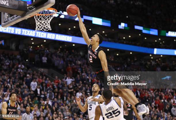 Zhaire Smith of the Texas Tech Red Raiders attempts to dunk the ball against Mikal Bridges of the Villanova Wildcats during the second half in the...