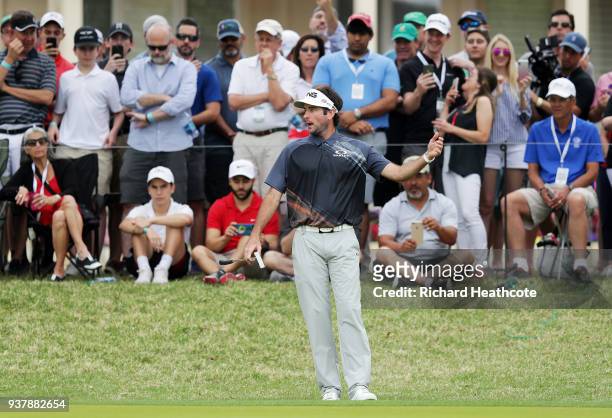 Bubba Watson of the United States reacts to his chip on the fifth hole during his final round match against Kevin Kisner of the United States in the...