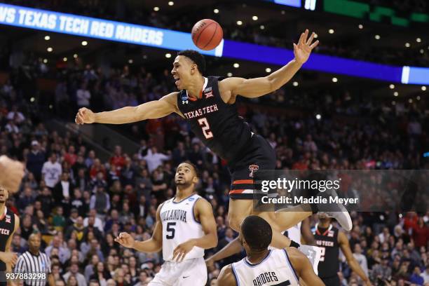 Zhaire Smith of the Texas Tech Red Raiders is unable to dunk the ball against Mikal Bridges of the Villanova Wildcats during the second half in the...