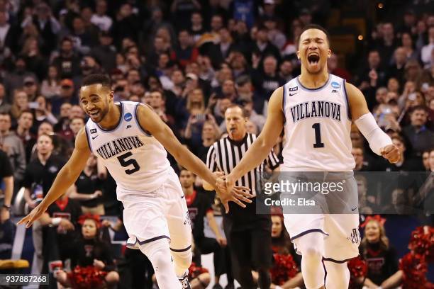 Phil Booth and Jalen Brunson of the Villanova Wildcats celebrate defeating the Texas Tech Red Raiders 71-59 in the 2018 NCAA Men's Basketball...