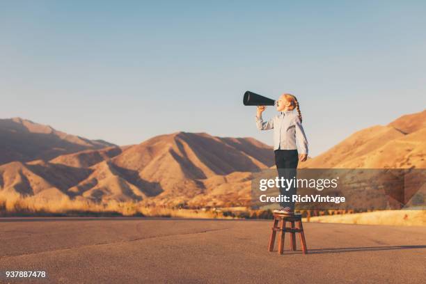 young business girl with megaphone - super excited suit stock pictures, royalty-free photos & images