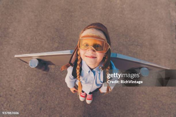 young business girl with jet pack - rocket pack stock pictures, royalty-free photos & images