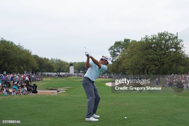 Kevin Kisner of the United States plays his shot from the seventh tee during his final round match against Bubba Watson of the United States in the...