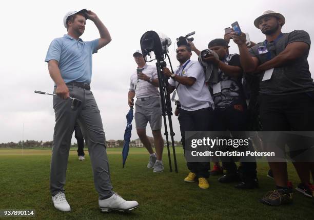 Brice Garnett reacts to his putt on the 18th green to win during the final round of the Corales Puntacana Resort & Club Championship on March 25,...