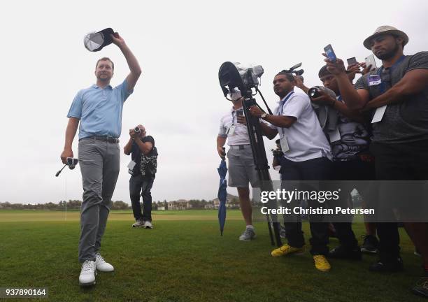 Brice Garnett reacts to his putt on the 18th green to win during the final round of the Corales Puntacana Resort & Club Championship on March 25,...