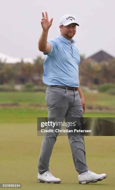 Brice Garnett reacts to his putt on the 18th green to win during the final round of the Corales Puntacana Resort & Club Championship on March 25,...