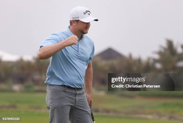 Brice Garnett reacts to his putt on the 18th green to win during the final round of the Corales Puntacana Resort & Club Championship on March 25,...