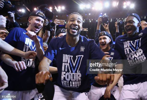 Phil Booth of the Villanova Wildcats celebrates with teammates after defeating the Texas Tech Red Raiders 71-59 in the 2018 NCAA Men's Basketball...