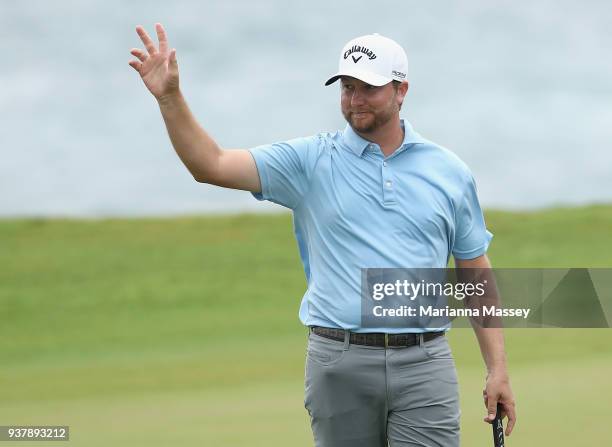 Brice Garnett reacts to his putt on the 18th green to win during the final round of the Corales Puntacana Resort & Club Championship on March 25,...