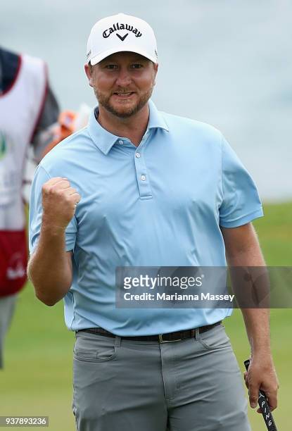 Brice Garnett reacts to his putt on the 18th green to win during the final round of the Corales Puntacana Resort & Club Championship on March 25,...