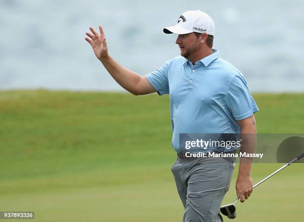 Brice Garnett reacts to his putt on the 18th green to win during the final round of the Corales Puntacana Resort & Club Championship on March 25,...