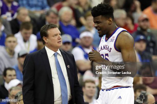 Head coach Bill Self speaks with Udoka Azubuike of the Kansas Jayhawks against the Duke Blue Devils during the first half in the 2018 NCAA Men's...