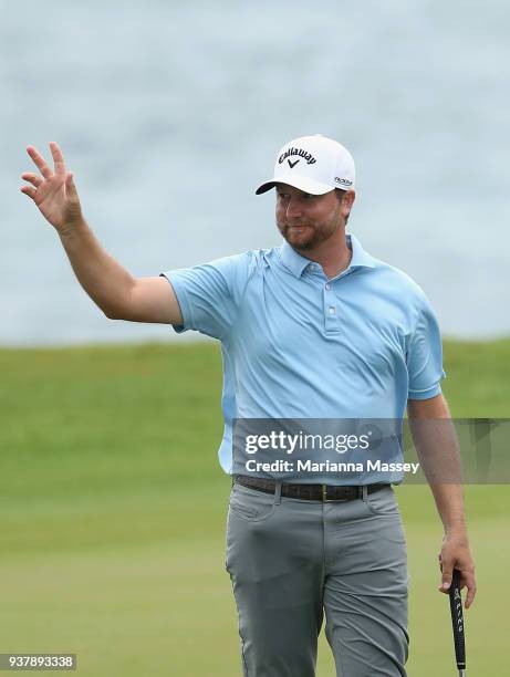 Brice Garnett reacts to his putt on the 18th green to win during the final round of the Corales Puntacana Resort & Club Championship on March 25,...