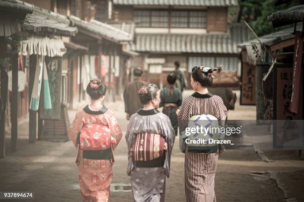 traditional japanese village from 19th century - geisha and farmers - kimono stock pictures, royalty-free photos & images