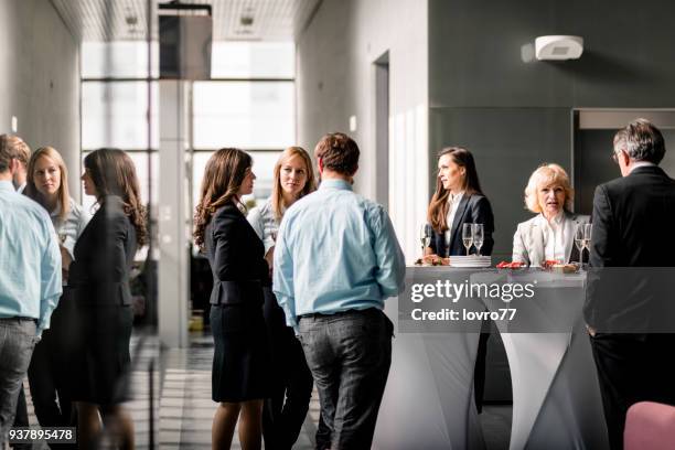 toasting to success - sessions imagens e fotografias de stock