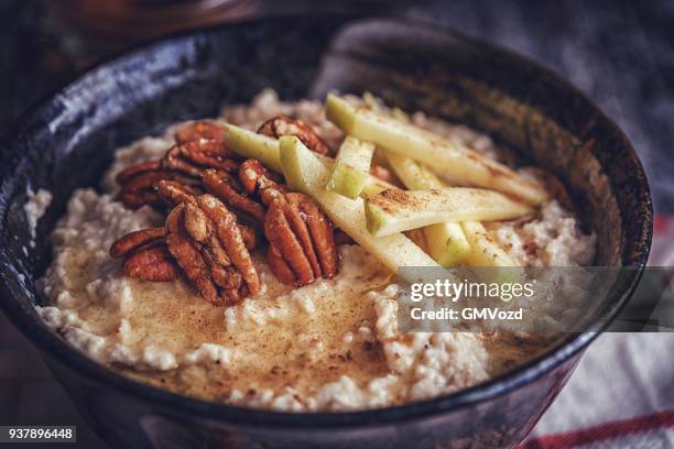 homemade pecan porridge with pears - porridge stock pictures, royalty-free photos & images